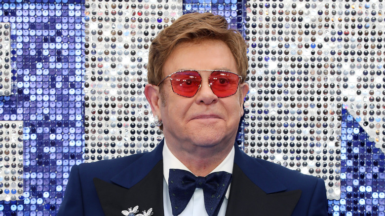 Elton John posing