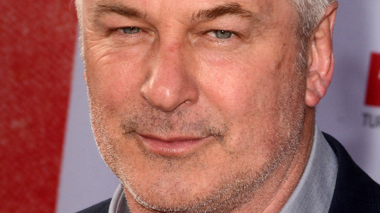 Alec Baldwin with a neutral expression