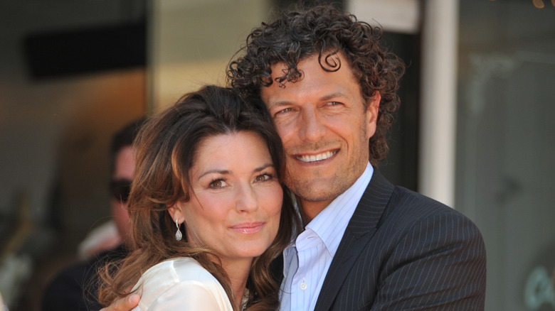 Shania Twain hugging her husband, Frédéric Thiébaud.