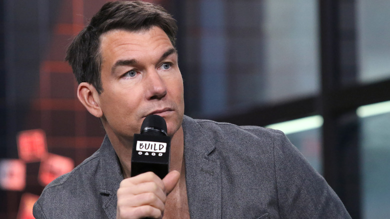 Jerry O'Connell holding a microphone