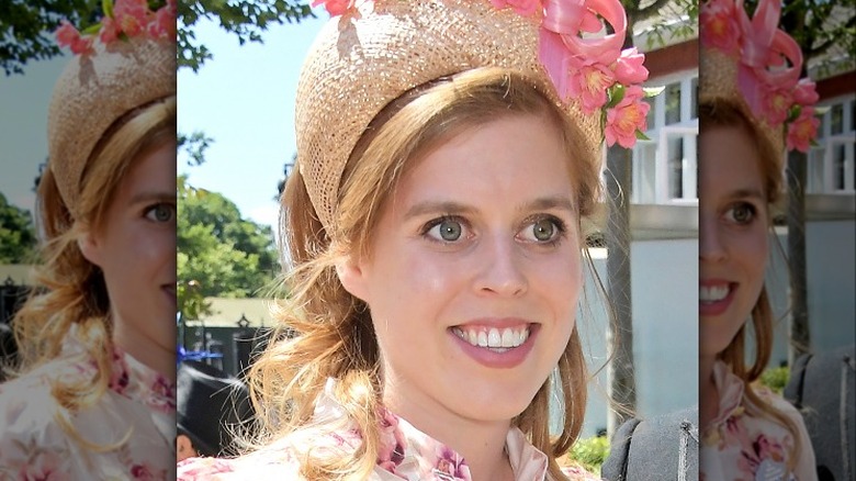 Princess Beatrice wearing pink floral fascinator
