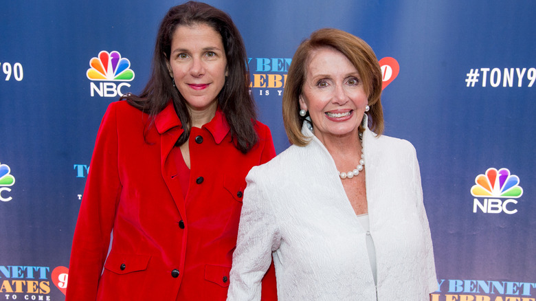Alexandra and Nancy Pelosi pose together.