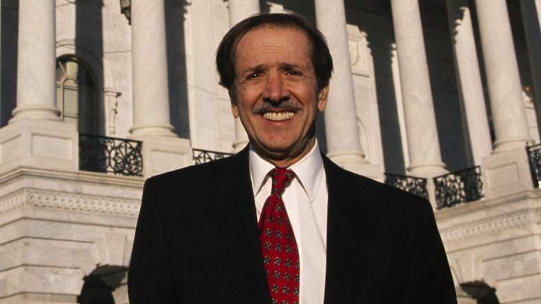 Sonny Bono standing in front of government building
