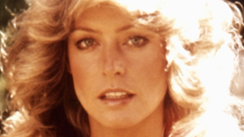 Farrah Fawcett long blonde hair pouting