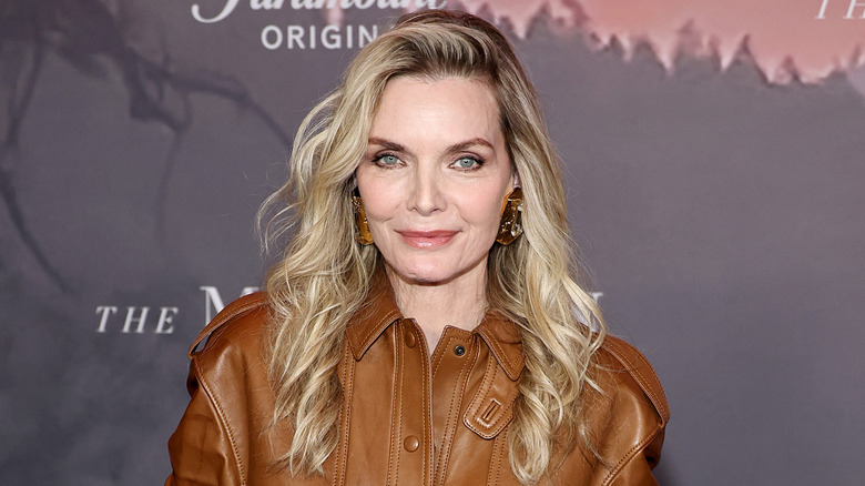 Michelle Pfieffer smiling at event for The Madison