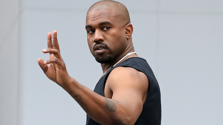 Kanye 'Ye' West signals to the cameras
