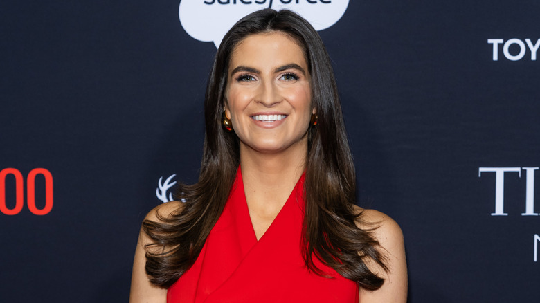 Kaitlan Collins in a red dress
