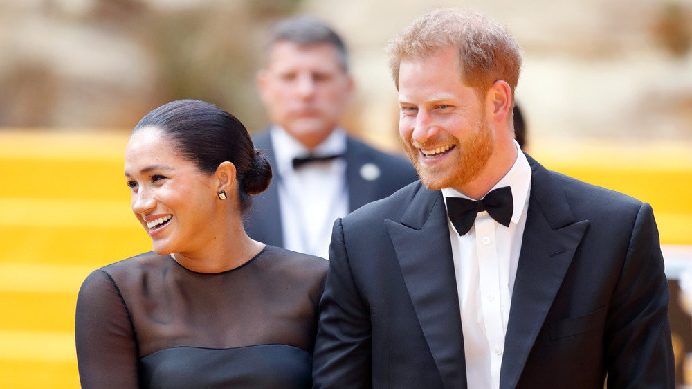 Meghan Markle and Prince Harry smiling