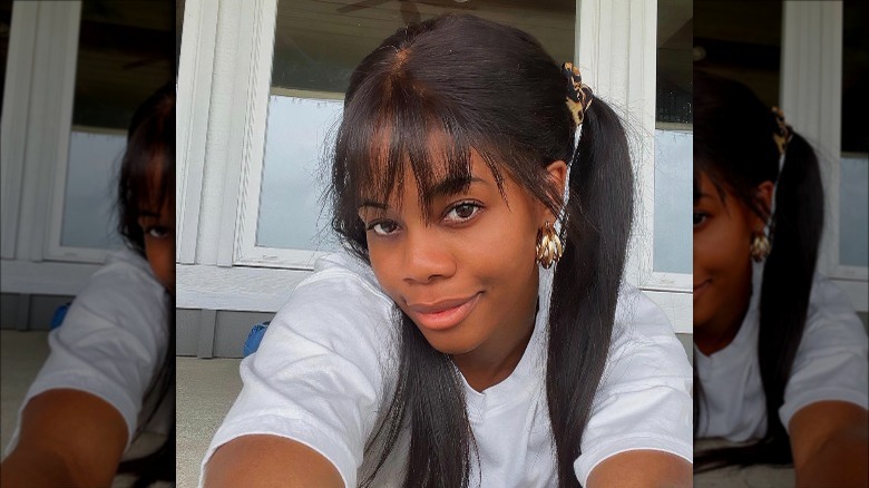 Gabby Douglas posing for selfie