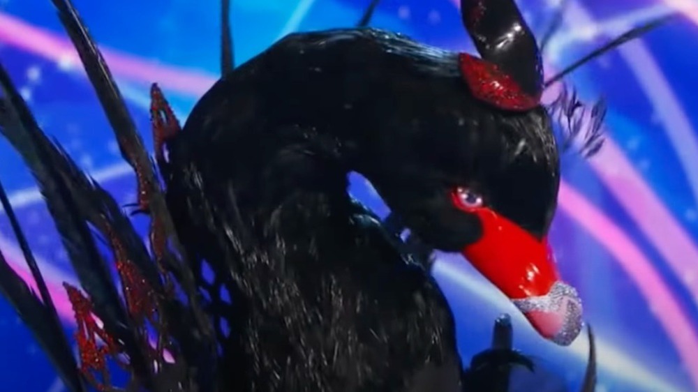 The Masked Singer's Black Swan onstage during the competition