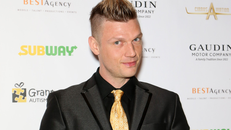 Nick Carter, smiling