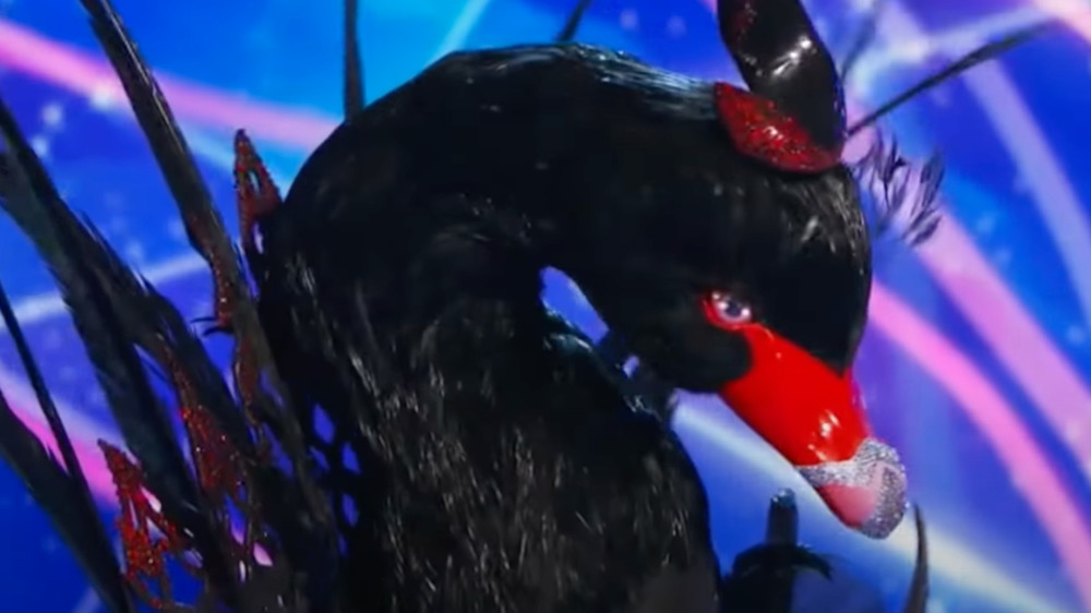 The Masked Singer's Black Swan onstage during the competition
