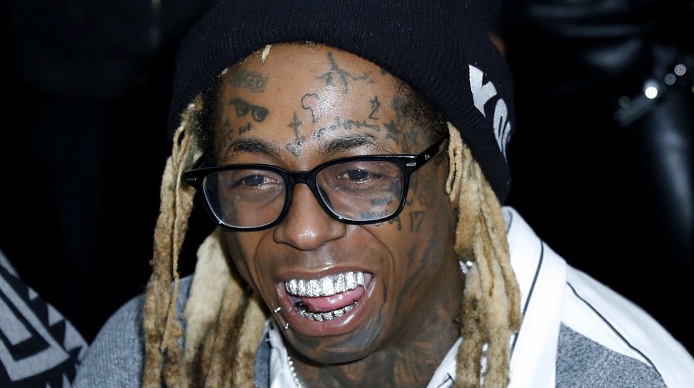 Lil Wayne Gets Cross Face Tattoo Restored