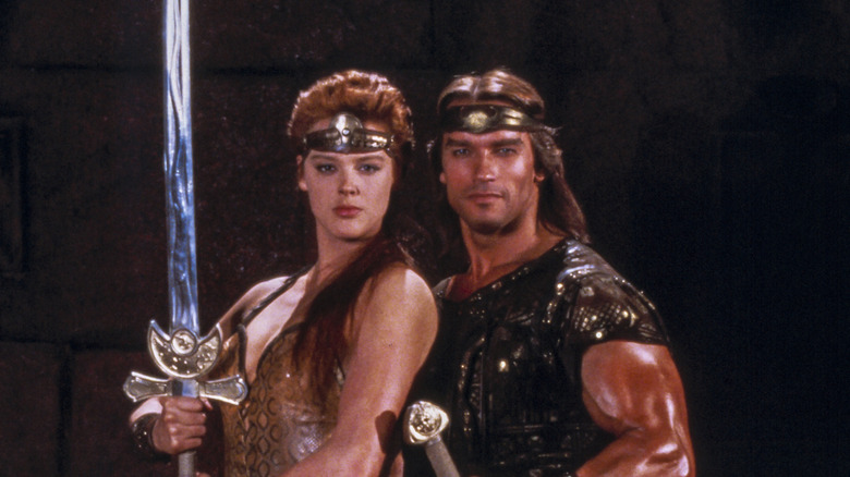 Arnold Schwarzenegger and Brigitte Nielson in a Red Sonja promo photo
