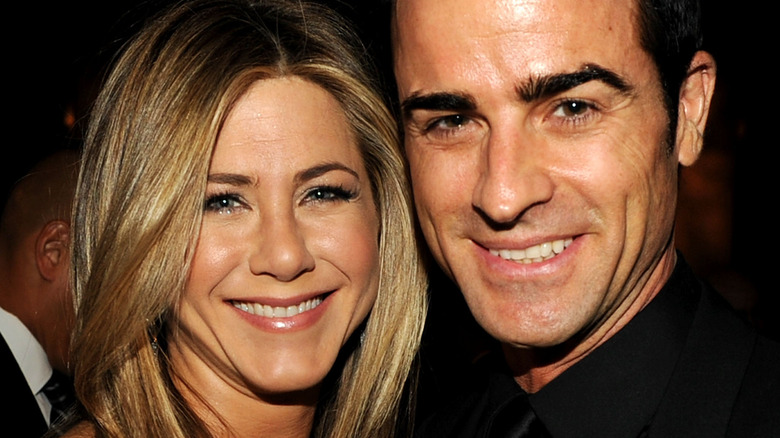 Jennifer Aniston and Justin Theroux smiling