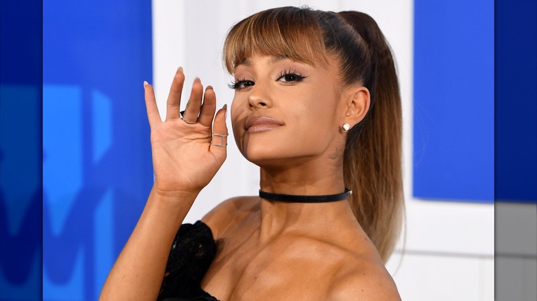 Ariana Grande waving