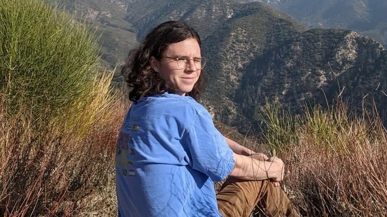 Charlie McDermott posing for mountainside snap