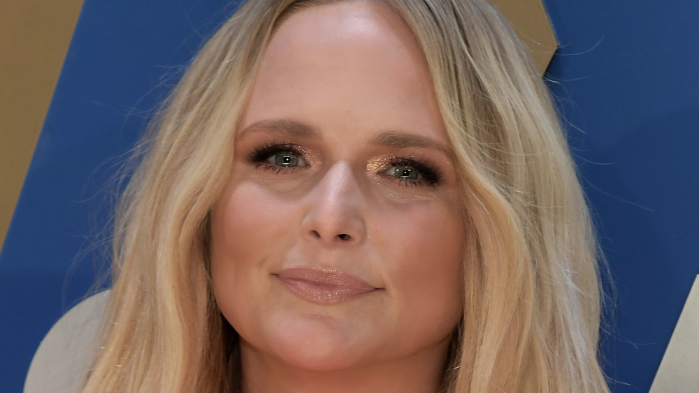 Miranda Lambert, smiling, hair down, pink dress, red carpet in 2020, dressed up