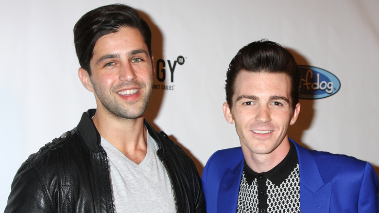 Drake Bell and Josh Peck smiling