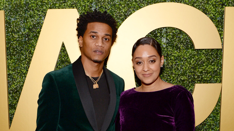 Tia Mowry and Cory Hardrict posing