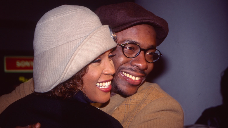 Whitney Houston and Bobby Brown hugging