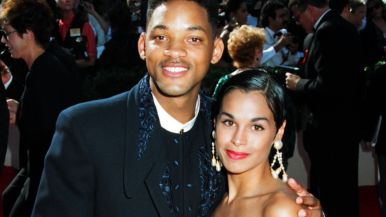 Will Smith's holding Sheree Zampino, smiling