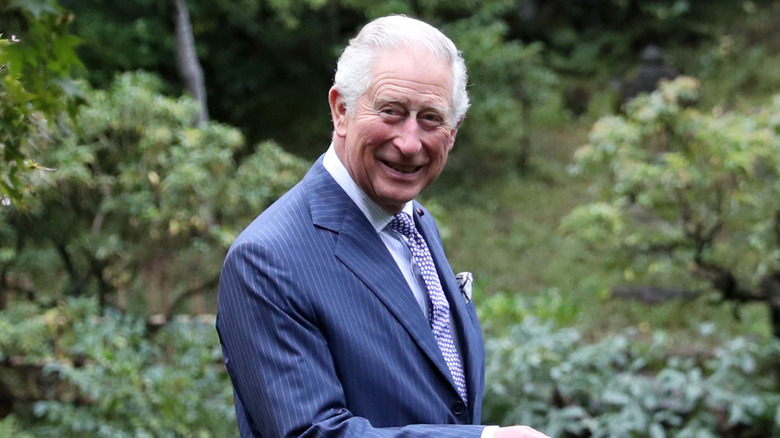 Prince Charles pictured in a forest