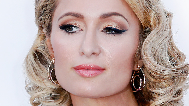 Paris Hilton wearing hoop earrings
