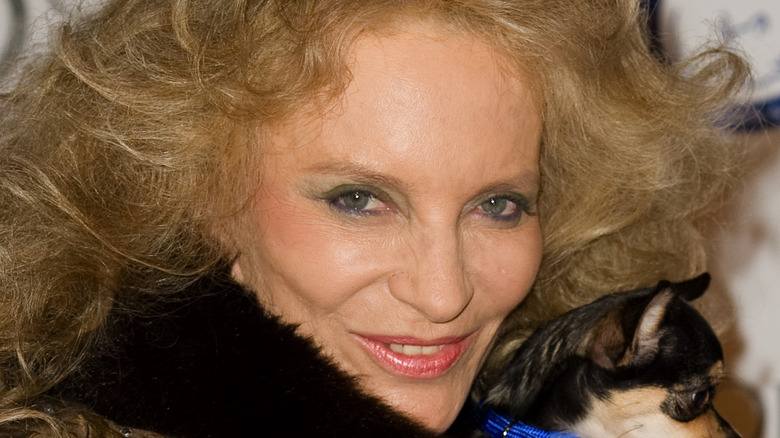 Princess Michael of Kent holding dog