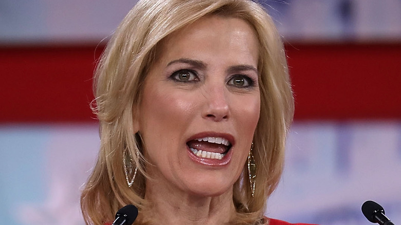 Laura Ingraham talking, wearing gold hoop earrings