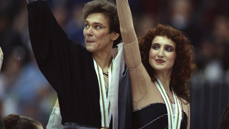 Sergei Ponomarenko and Marina Klimova waving at the crowd