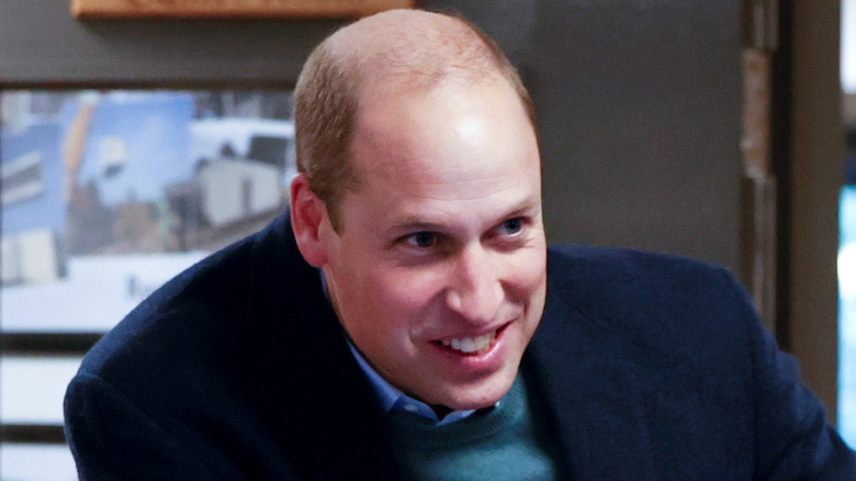 Prince William smiling blue suit