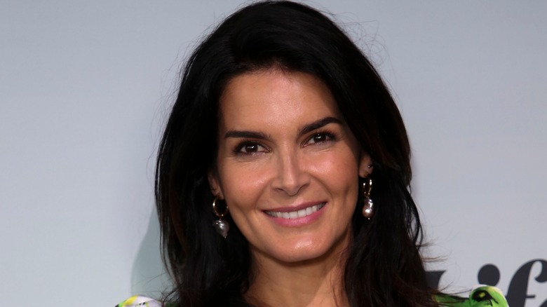 Angie Harmon smiling