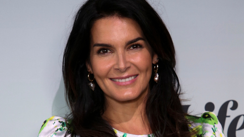 Angie Harmon smiling