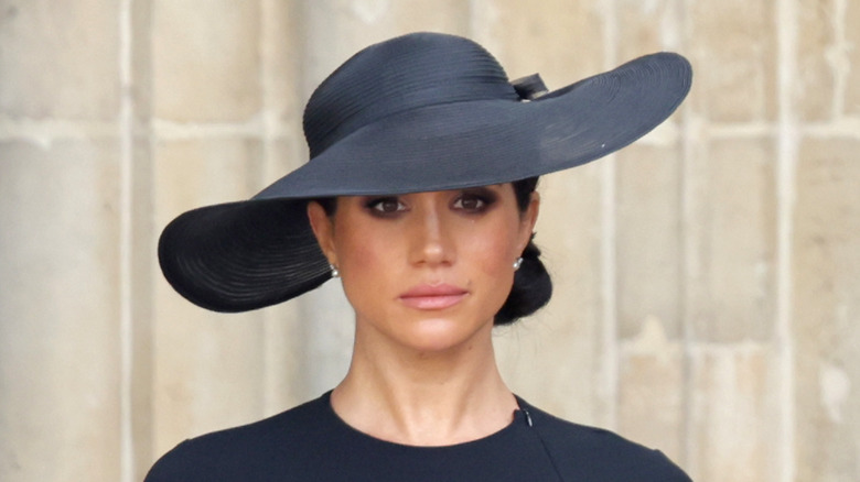 Meghan Markle in black hat