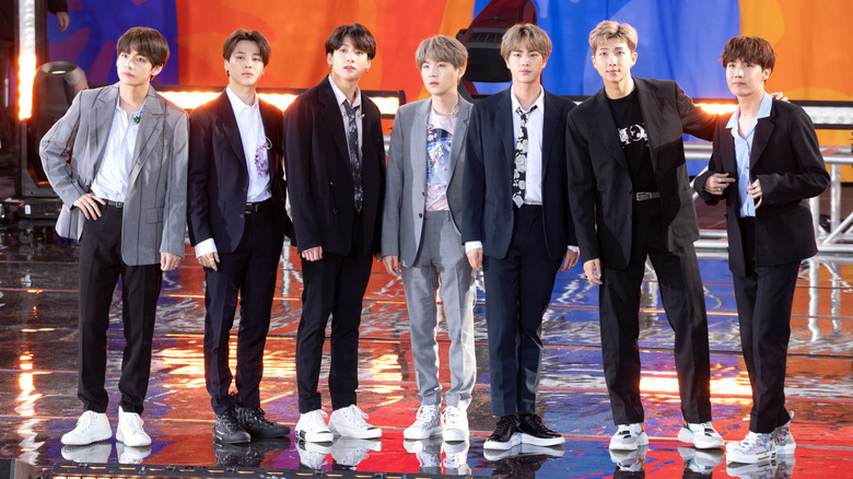 BTS poses onstage