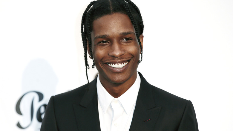 ASAP Rocky poses and smiles for a photo
