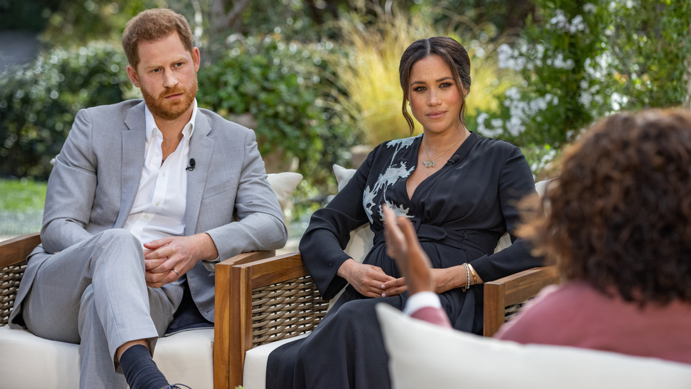 Prince Harry and Meghan Markle speaking with Oprah Winfrey
