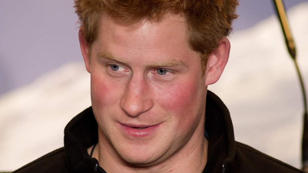 Young Prince Harry smirking