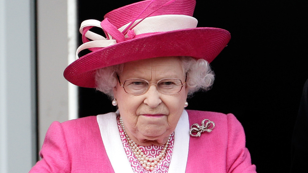 Queen Elizabeth II grimacing