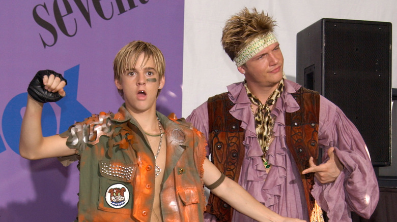 Aaron Carter and Nick Carter both posing