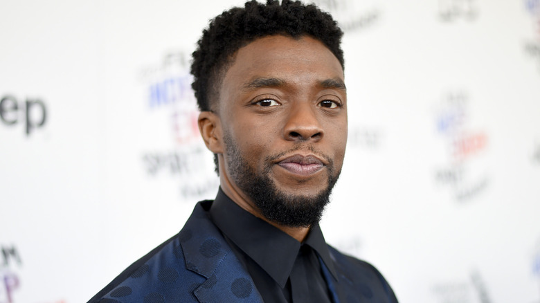Actor Chadwick Boseman poses on the red carpet