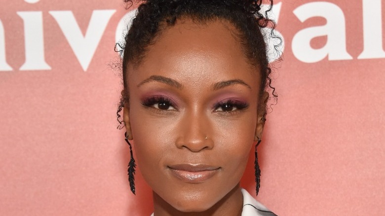 Yaya DaCosta smiling