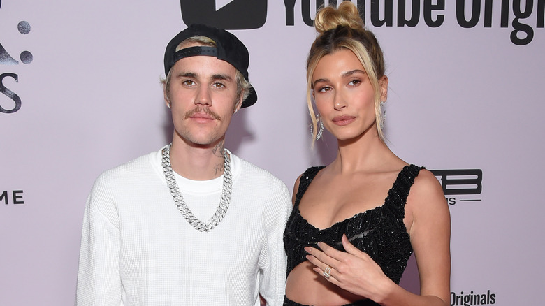 Justin Bieber and Hailey Bieber pose on the red carpet