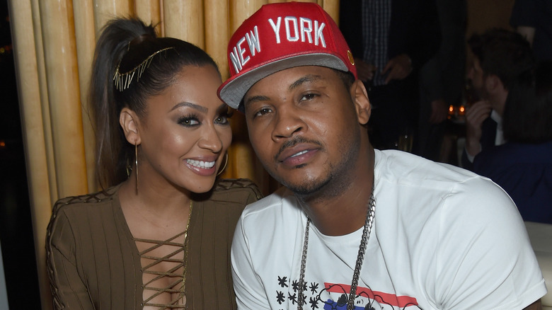 La La Anthony and Carmelo Anthony smiling