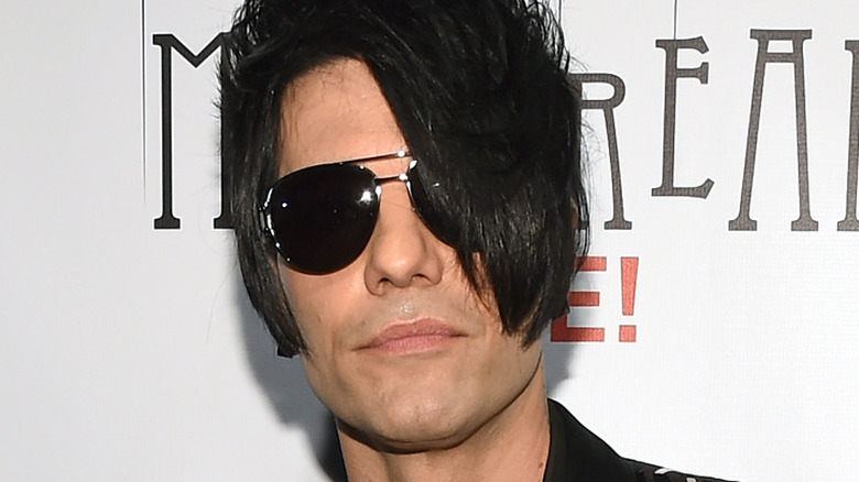 Criss Angel wearing dark glasses