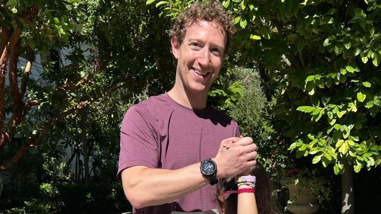 Mark Zuckerberg smiling after completing a 5k run