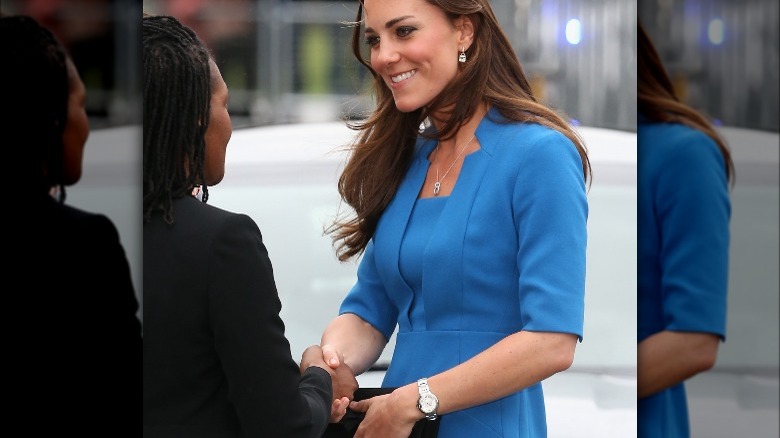 Kate Middleton shaking hands