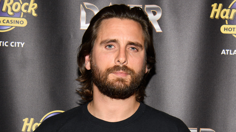Scott Disick posing for cameras