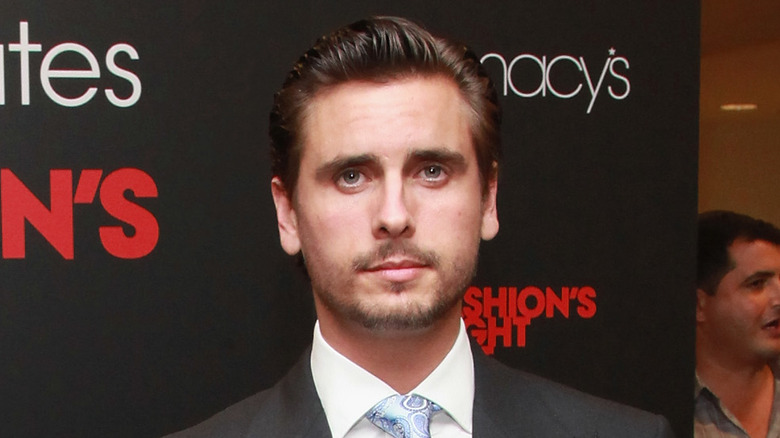 Scott Disick in a dark suit